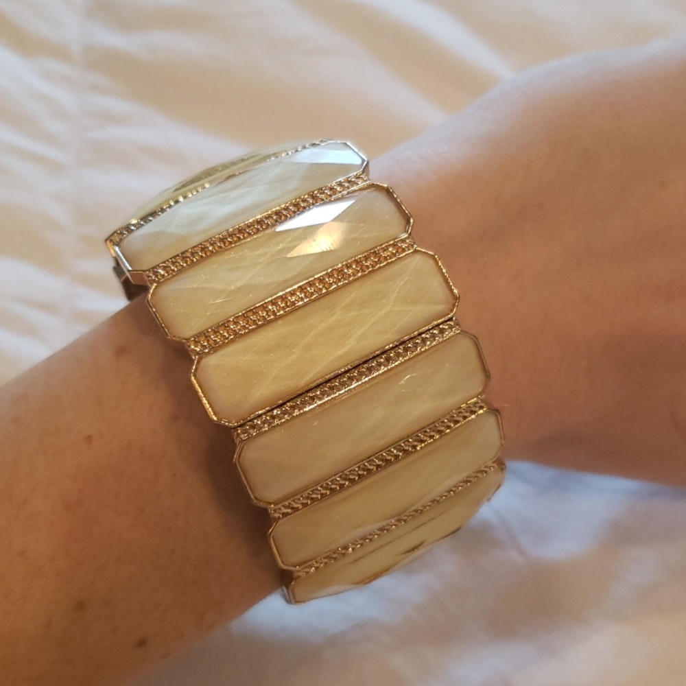 Gold cuff bracelet mother of pearl like accent